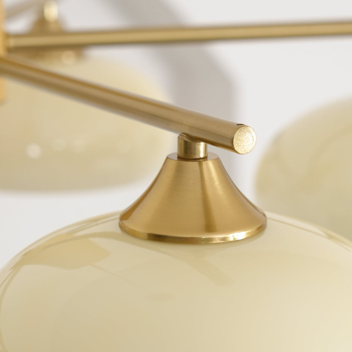 Elliptical Glass Globe Chandelier with Brass Arms | Dining Table Light Fixture
