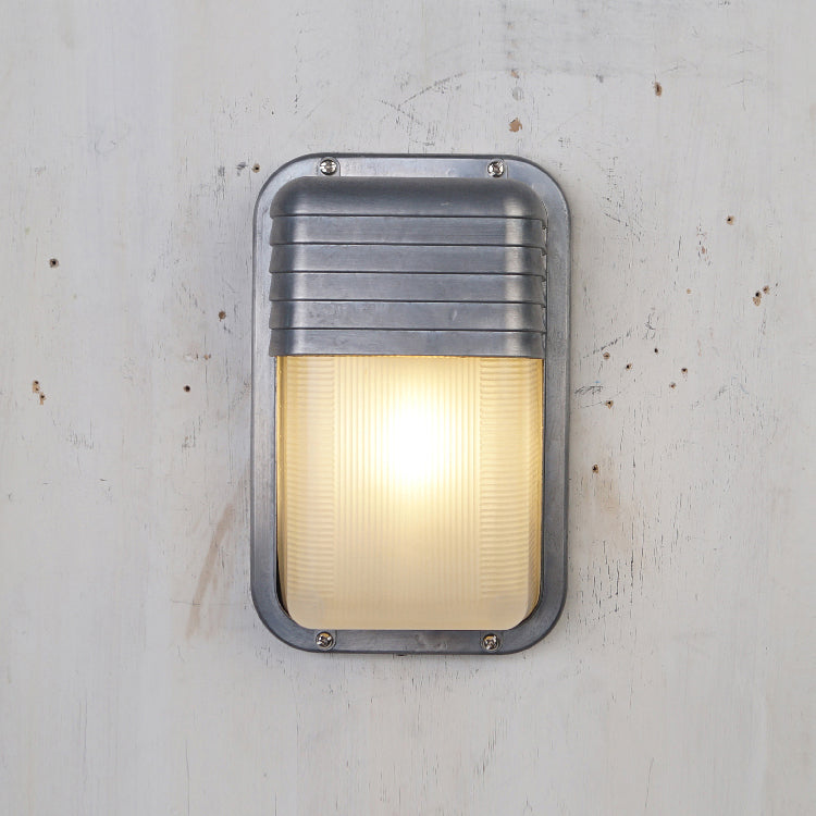 Aluminum Outdoor Bulkhead Wall Sconce with Sealed Glass | Weather-Resistant Light