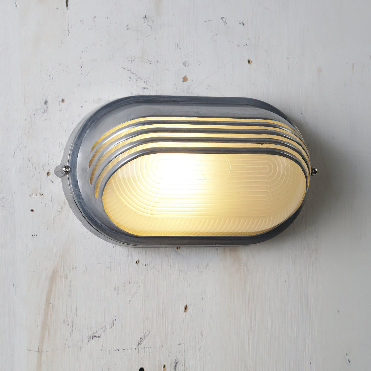 Aluminum Outdoor Bulkhead Wall Sconce with Sealed Glass | Weather-Resistant Light