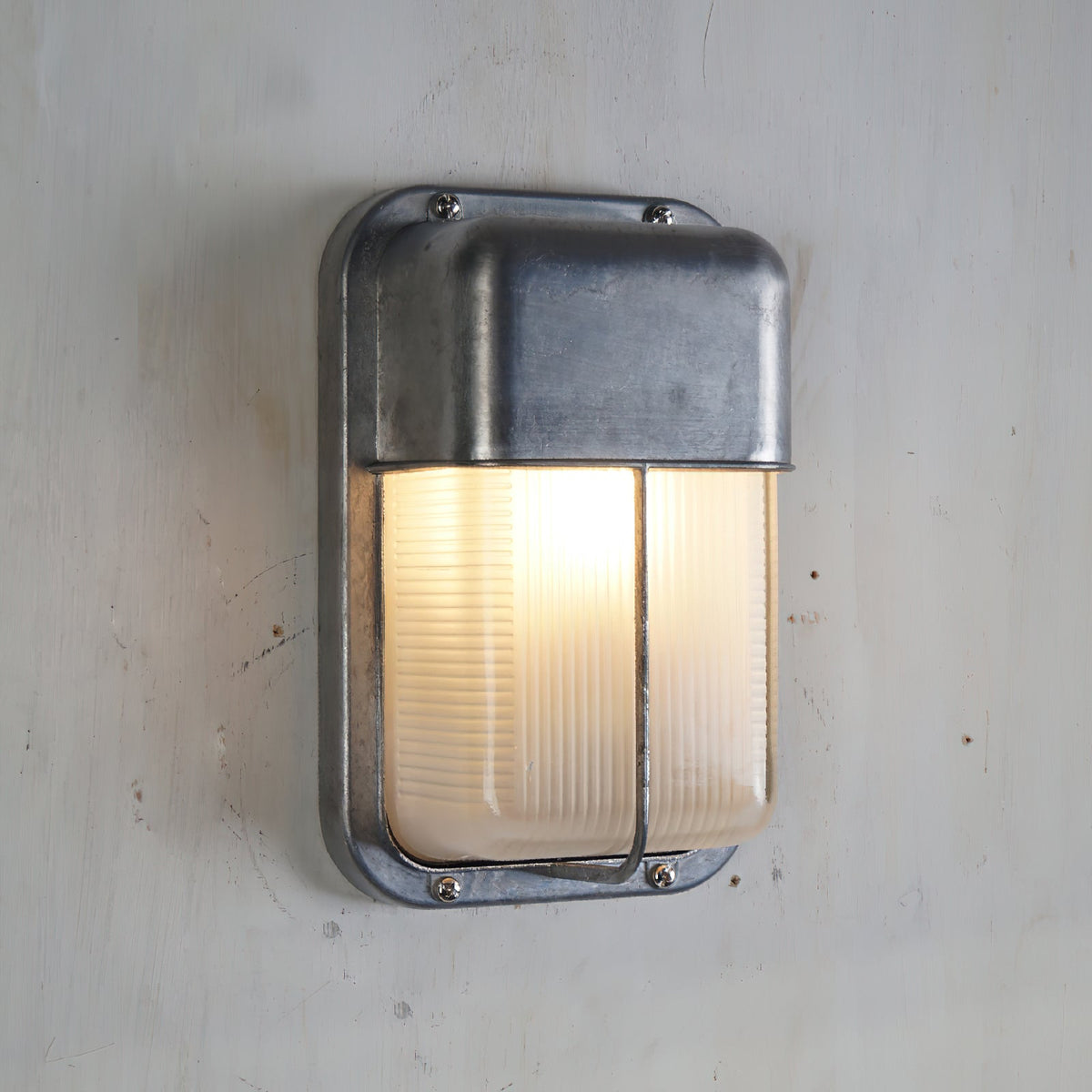 Aluminum Outdoor Bulkhead Wall Sconce with Sealed Glass | Weather-Resistant Light
