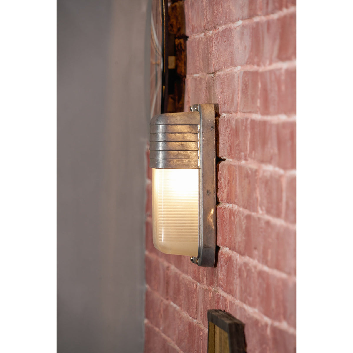 Aluminum Outdoor Bulkhead Wall Sconce with Sealed Glass | Weather-Resistant Light