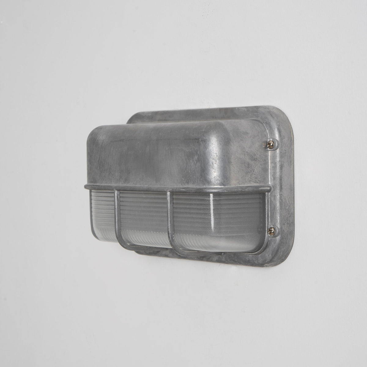 Aluminum Outdoor Bulkhead Wall Sconce with Sealed Glass | Weather-Resistant Light