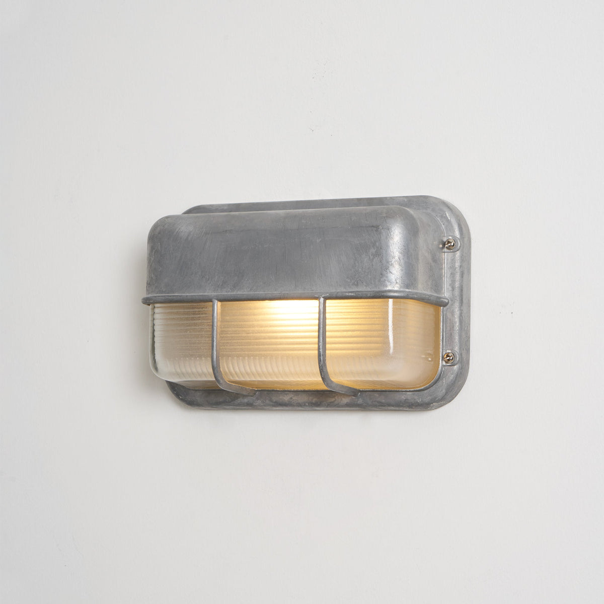 Aluminum Outdoor Bulkhead Wall Sconce with Sealed Glass | Weather-Resistant Light