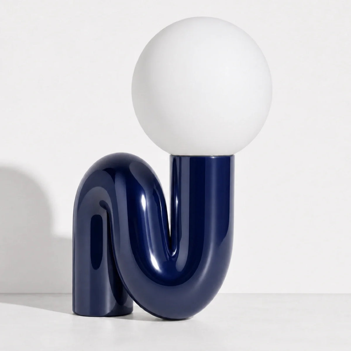 Sculptural S-Curve Table Lamp with Chrome Base | Frosted Glass Globe for Ambient Glow