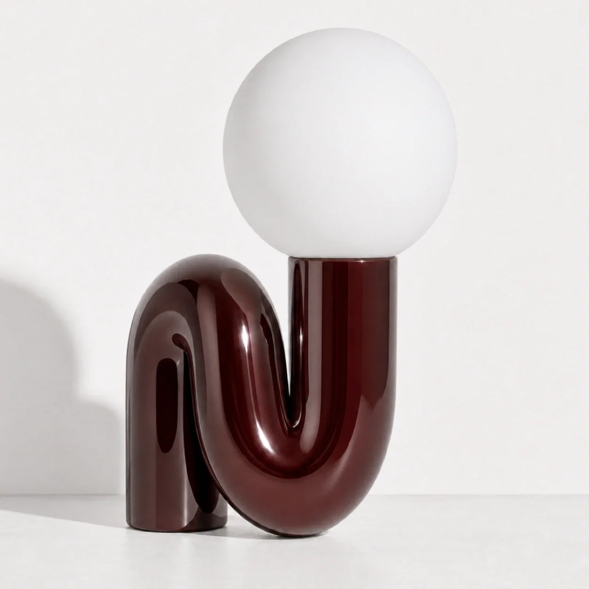 Sculptural S-Curve Table Lamp with Chrome Base | Frosted Glass Globe for Ambient Glow