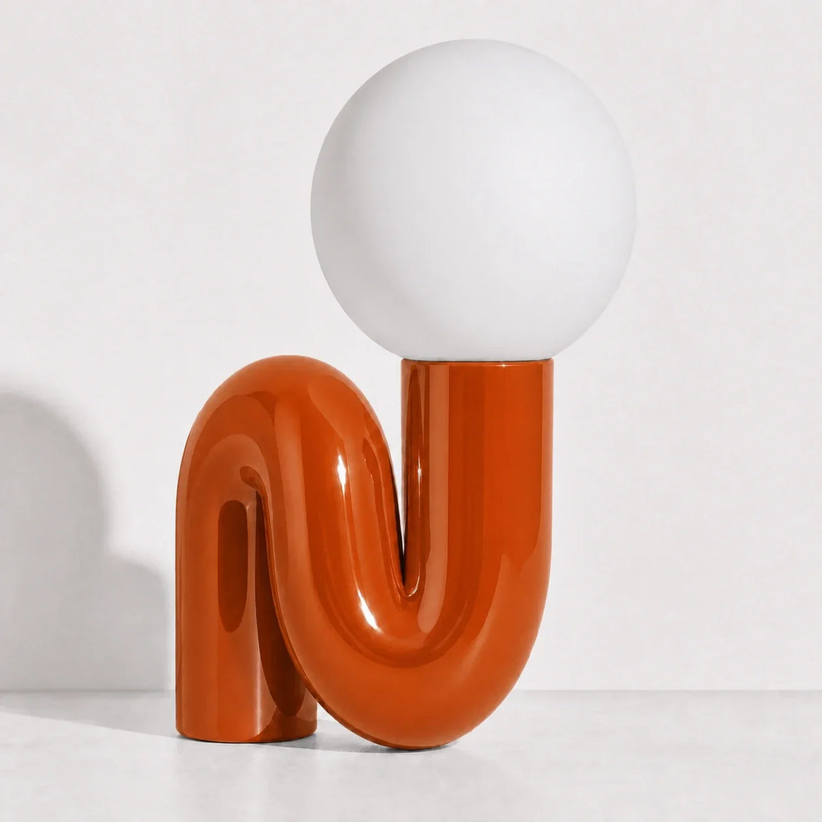 Sculptural S-Curve Table Lamp with Chrome Base | Frosted Glass Globe for Ambient Glow